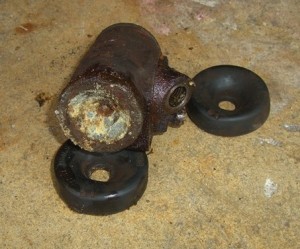 Badly corroded and frozen wheel cylinder from the 53 chevy. This was replaced in 1992. Jersey Salt air did this.